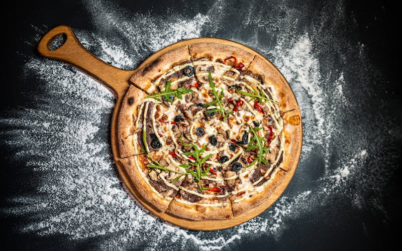 Davanis meat lovers pizza with sausage pepperoni and bacon